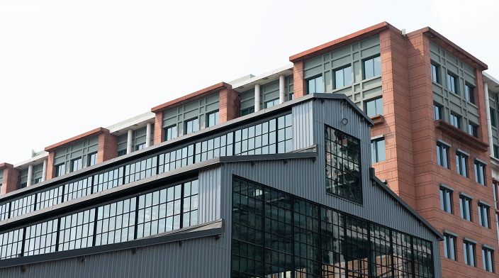 Older building that has been restored next to a new construction building, Southwest DC